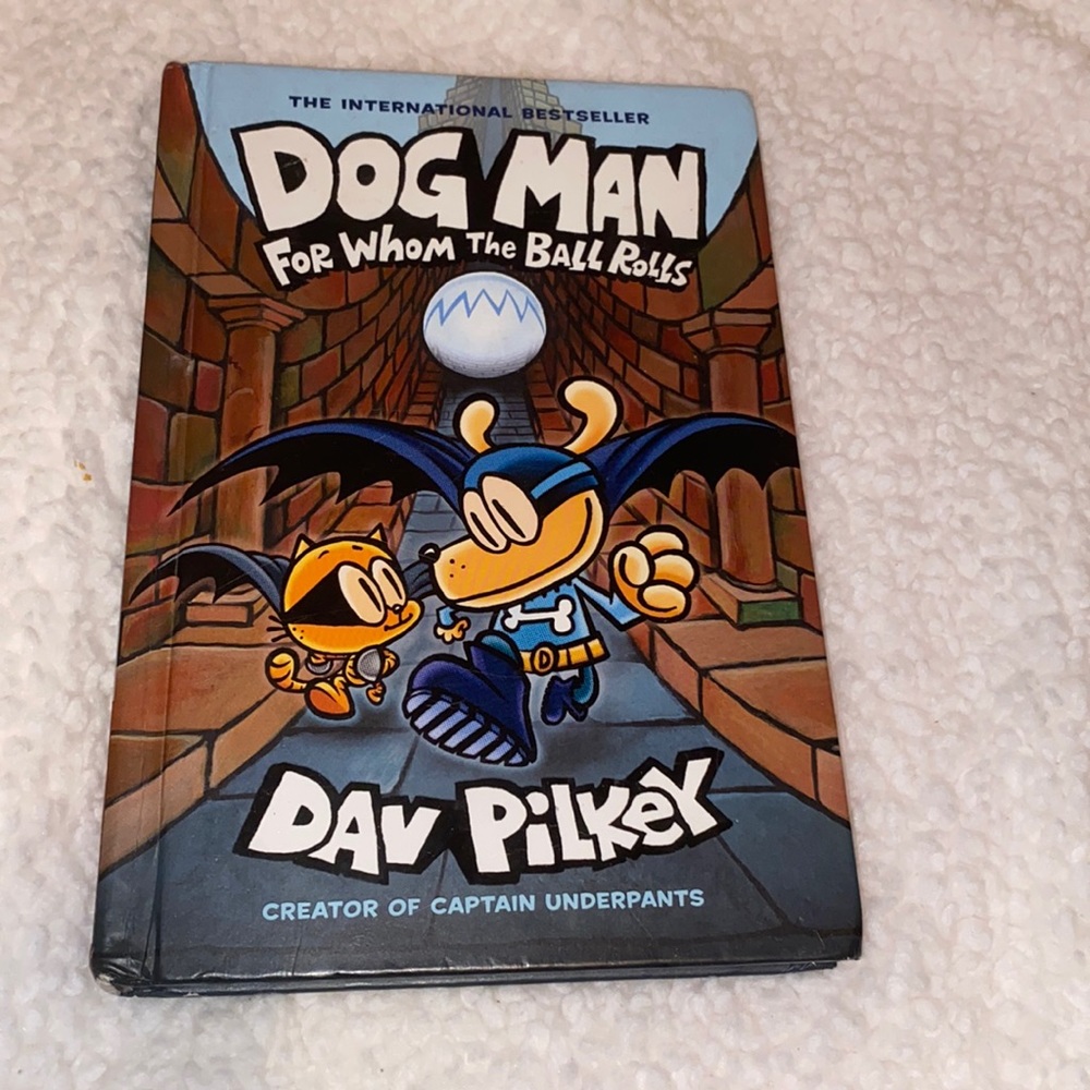 Dog Man for whom the ball rolls